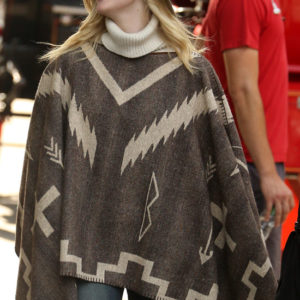 a rainy day in new york elle fanning turtleneck poncho sweater