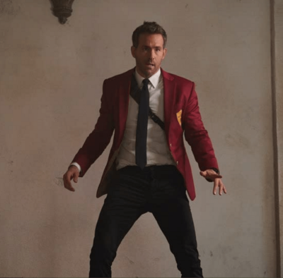 Red Notice Ryan Reynolds Red Blazer