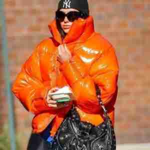 Dua Lipa’s Orange Puffer Jacket