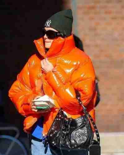 Dua Lipa’s Orange Puffer Jacket for Women