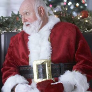 John B. Lowe A Kiss Before Christmas Red Coat